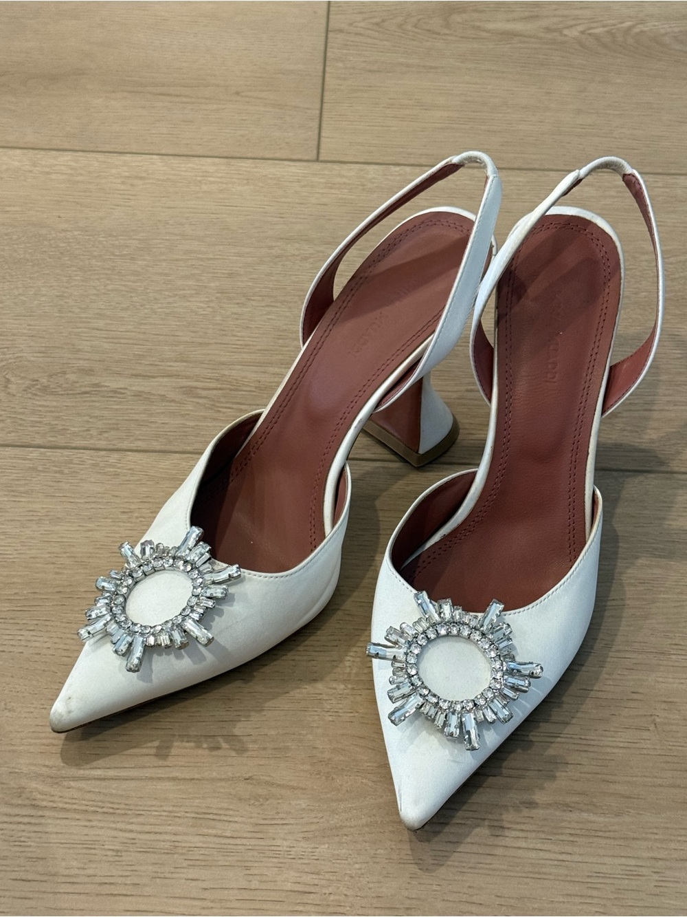 Amina Muaddi White Pointed Slingback Heels with Crystal Sunburst - inspired